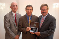 Mark Steffen (center) of Winning Solutions, Inc. is pictured accepting a plaque recognizing WSI’s service to the Iowa Sports Foundation from Former Governor Terry Branstad (right). Jim Halihan Executive Director of the Iowa Sports Foundation (left) Former Iowa Governor Robert Ray, among others was in attendance.