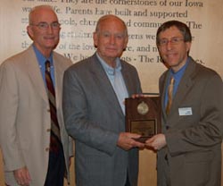 Mark Steffen Accepting an Award from the Iowa Sports Foundation.