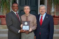 Mark Steffen (center) of Winning Solutions, Inc. is pictured accepting a plaque recognizing WSI’s service to the Iowa Sports Foundation from Former Governor Terry Branstad (right). Jim Halihan Executive Director of the Iowa Sports Foundation (left) Former Iowa Governor Robert Ray, among others was in attendance.